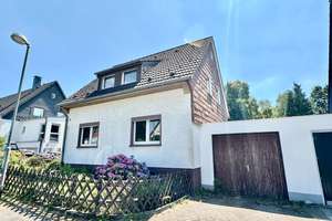 Traumhaft schönes Einfamilienhaus mit Garten und Garage in Essen Schuir / Bredeney