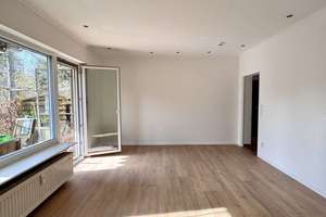 Lichtdurchflutete, sanierte 3-Zimmer-Wohnung mit Terrasse, Gartenanteil & TG - sofort verlieben