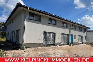 Neubau in Niendorf: 3-Zimmer-Maisonette-ETW im Effizienzhaus 55 mit Terrasse und eigenem Garten 