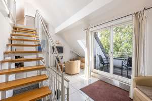 AIGNER - Außergewöhnliche Maisonette mit Galerie, zwei Balkonen und Parkplatz