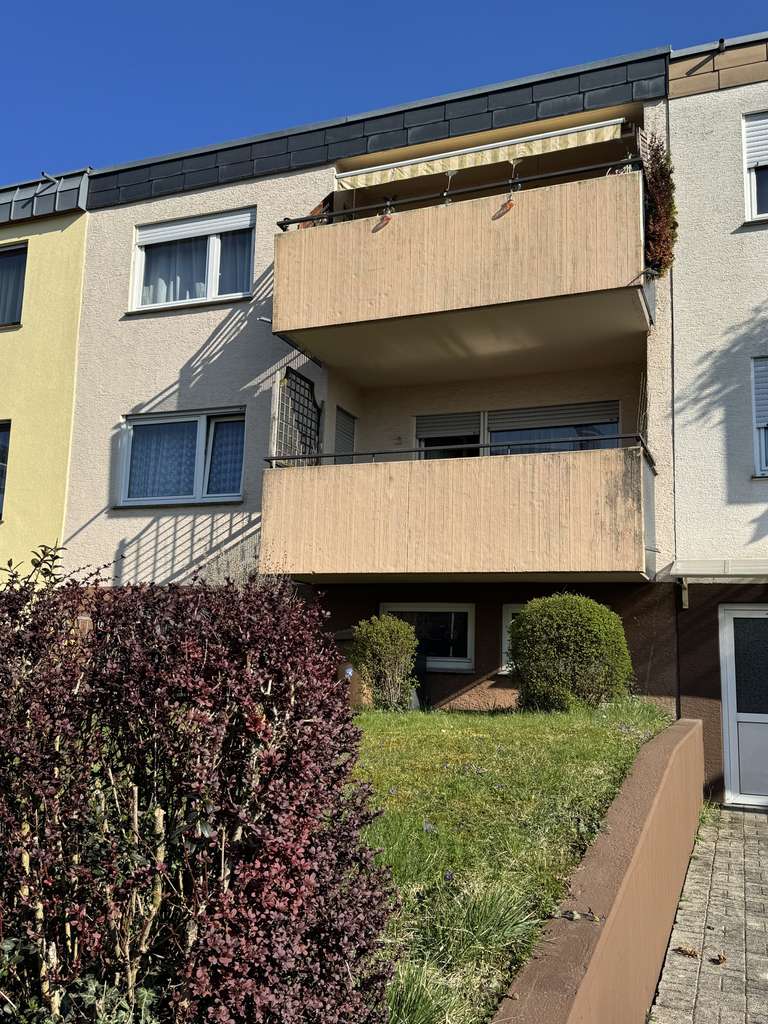 Immobilie in Remseck am Neckar - Wohnen in Neckarrems: 3-Zi.-EG-Wohnung mit Balkon & Hobbyraum im Zweifamilienhaus - Bild 0
