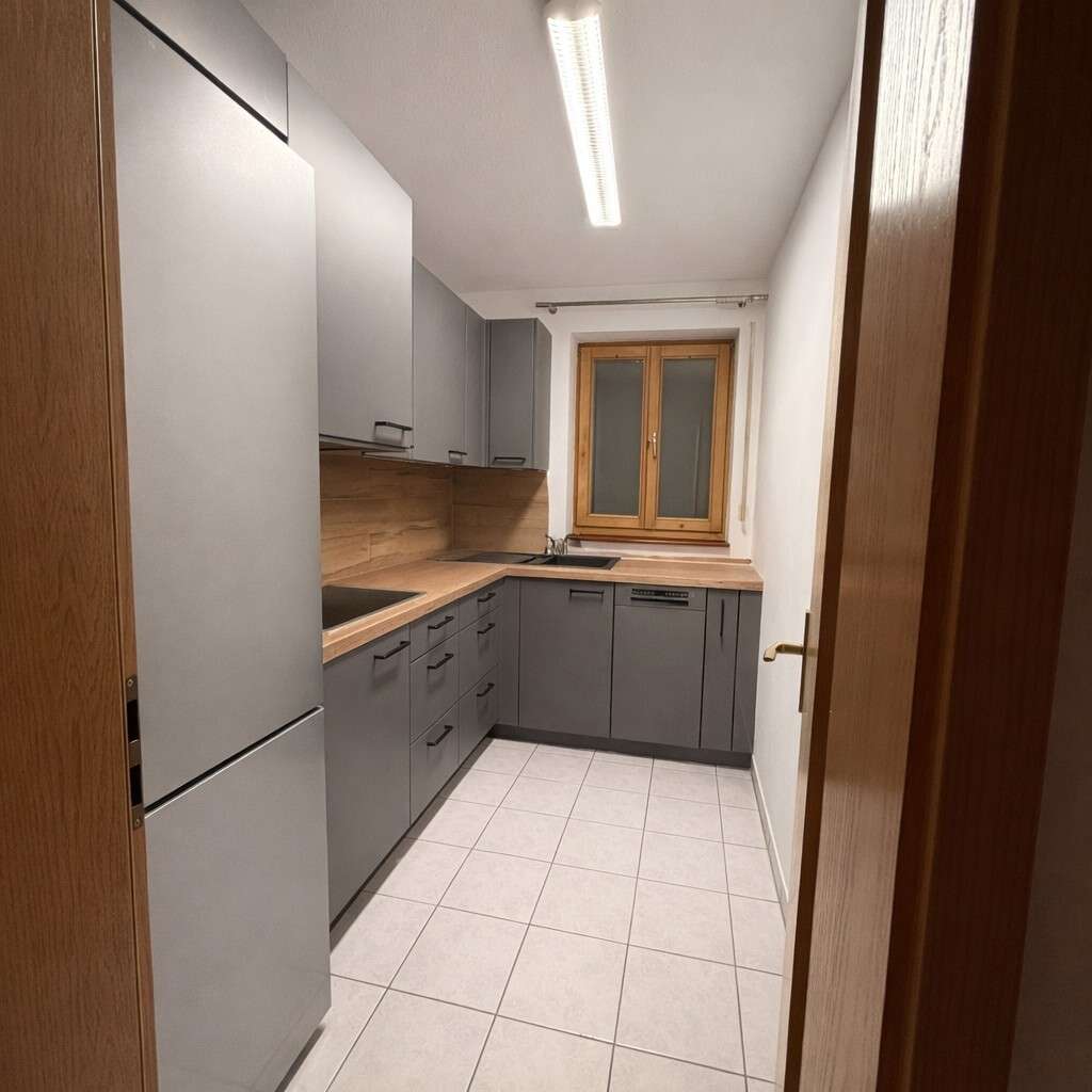 Immobilie in Holzkirchen - Helle Erdgeschosswohnung mit Garten und Tiefgarage - Bild 1