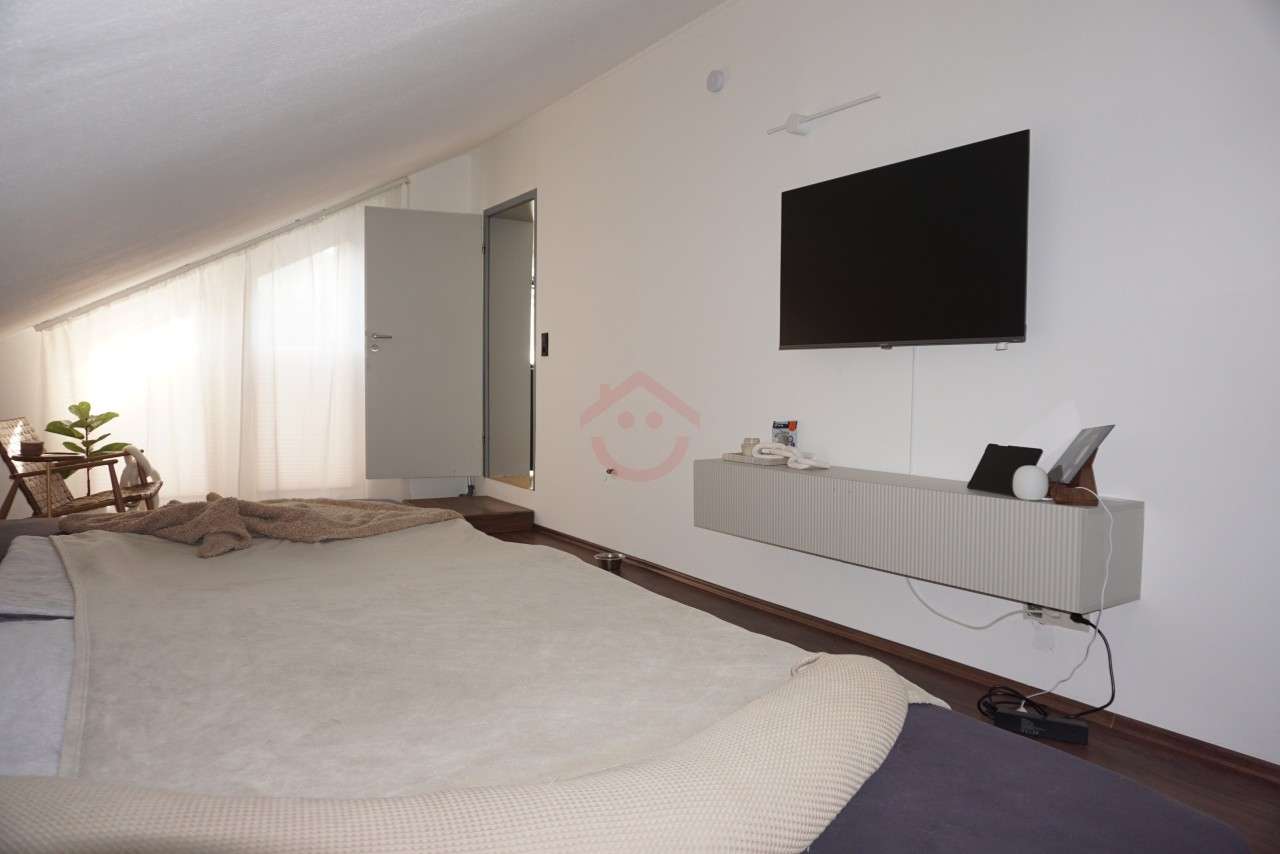 Immobilie in Buseck - Reduzierter Preis: Wohnhaus nach Architektenentwurf - Selber wohnen und vermieten zugleich! - Bild 1