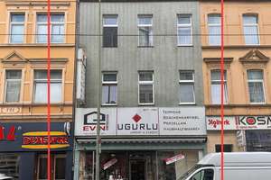Attraktives Mehrfamilienhaus mit großzügiger Gewerbefläche in zentraler Lage!