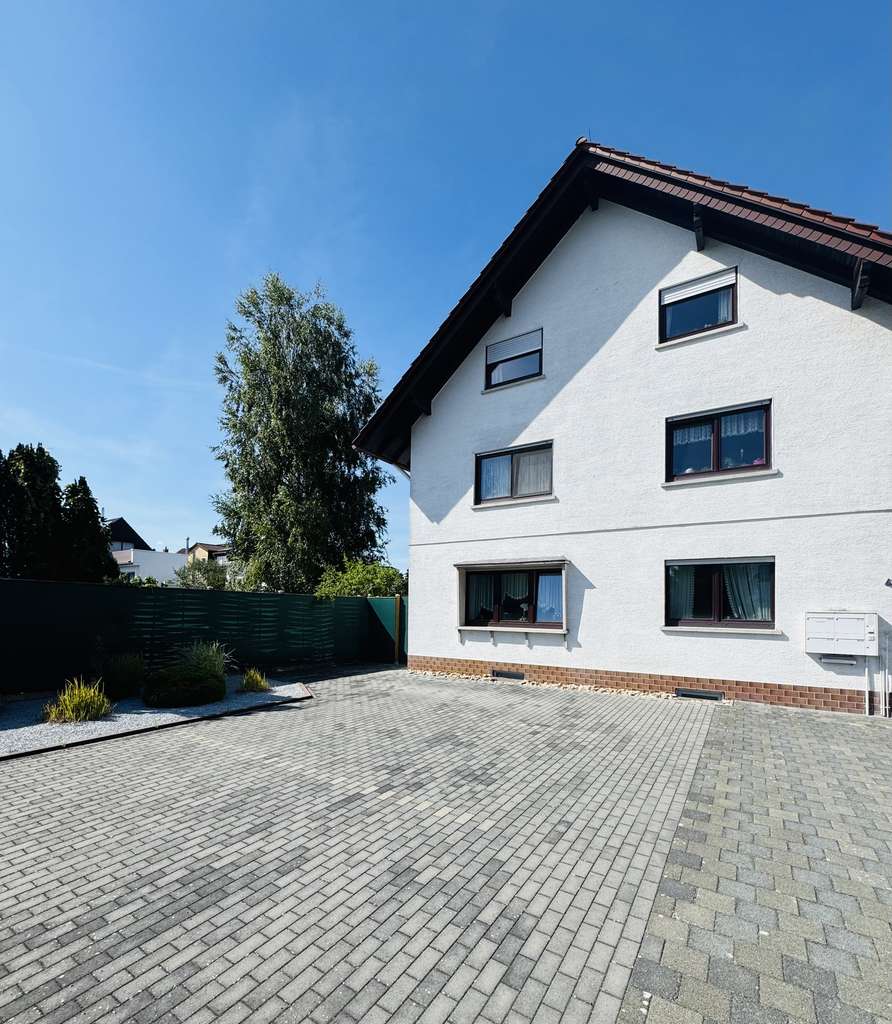 Immobilie in Bickenbach - Gepflegtes Mehrfamilienhaus mit flexiblen Nutzungsmöglichkeiten - Bild 0