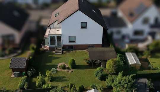 Bild von Einfamilienhaus in Eddersheim mit Wintergarten, Garten und Garage