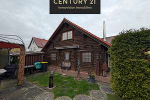 C21 Immovision: Holzbohlenhaus EEK A & Massives Zweifamilienhaus – Die vollständige Adresse der Immobilie erhältst du vom Anbieter., 31191 Algermissen – Vorschaubild 1