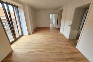 Exklusives Wohnen im Denkmalobjekt – 3 Zimmer, Balkon, Fußbodenheizung, HWR & Stellplatz inklusive