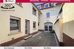 Vielseitig nutzbares 1-2 Familienhaus mit Innenhof und Garten in schöner Lage