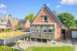 Vielseitiges Siedlungshaus mit Anbau in begehrter Lage in Norderstedt Alt-Garstedt – Die vollständige Adresse der Immobilie erhältst du vom Anbieter., 22848 Norderstedt – Vorschaubild 3