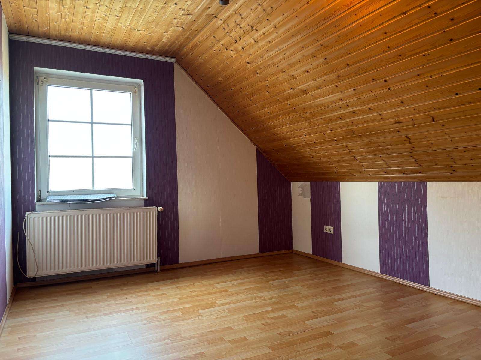 Immobilie in Großheide - Einfamilienhaus mit Einliegerwohnung in Sackgassenlage - Bild 0