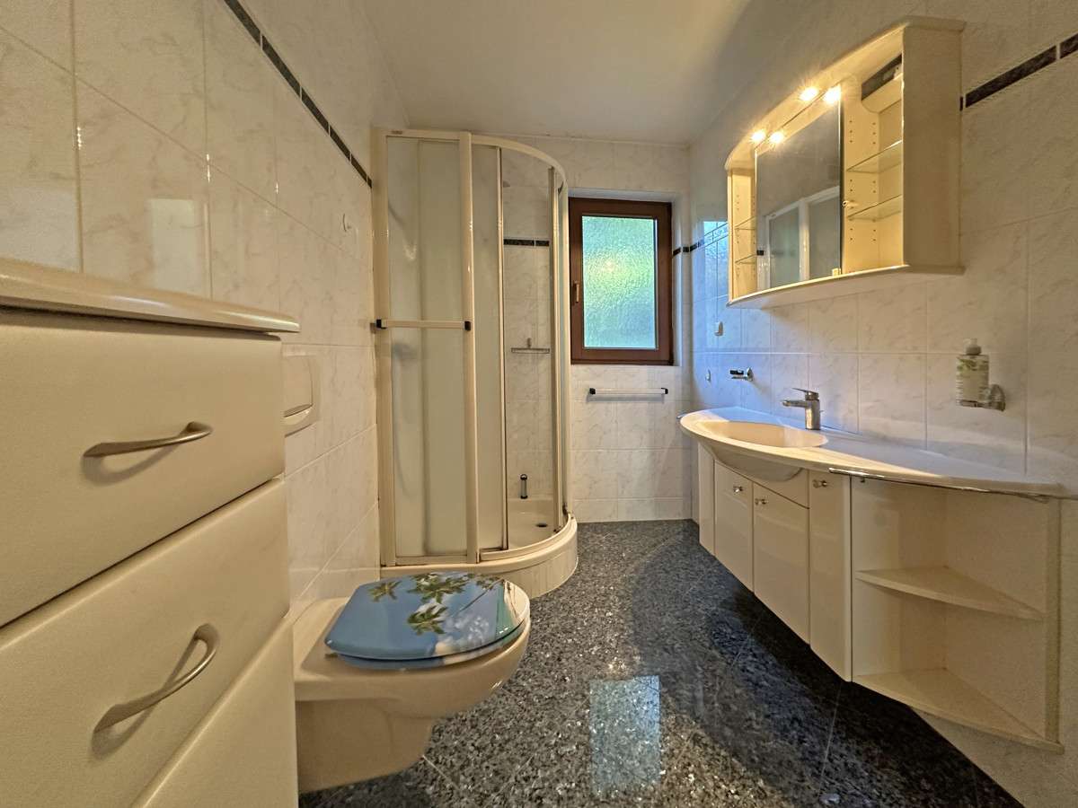 Immobilie in Ammersbek - Einfamilienhaus mit Charakter und Potenzial - Bild 0