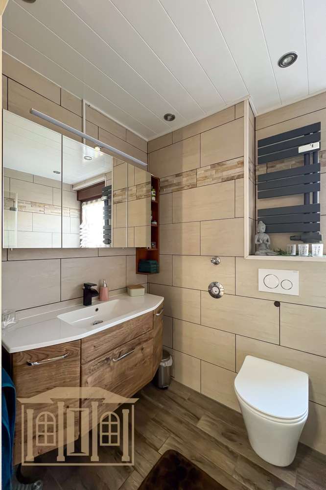 Immobilie in Lüdenscheid - Stilvoll modernisiert: Gemütliche Wohnung mit Kamin, Erker und Garten an der Volme - Bild 0