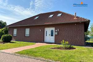 Moderner Bungalow mit viel Platz am Tief in Dornum – Die vollständige Adresse der Immobilie erhältst du vom Anbieter., 26553 Dornum – Vorschaubild 1
