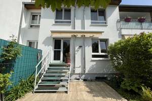 Moderne und gepflegte Maisonette-Wohnung mit eigenem Garten