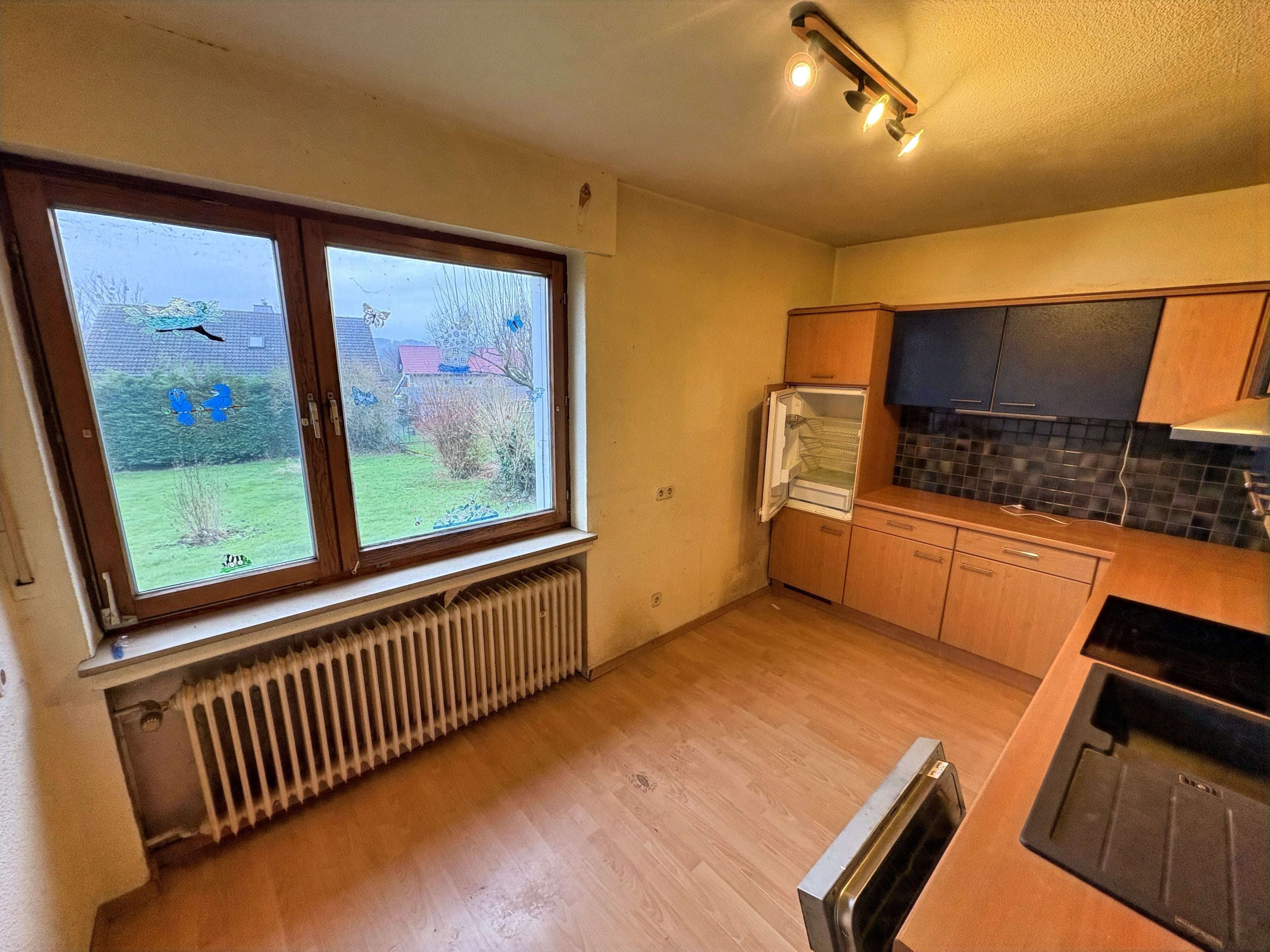 Immobilie in Kalletal - Einfamilienhaus mit großem Grundstück in ruhiger Sackgassenlage in Kalletal-Ortsteil - Bild 0