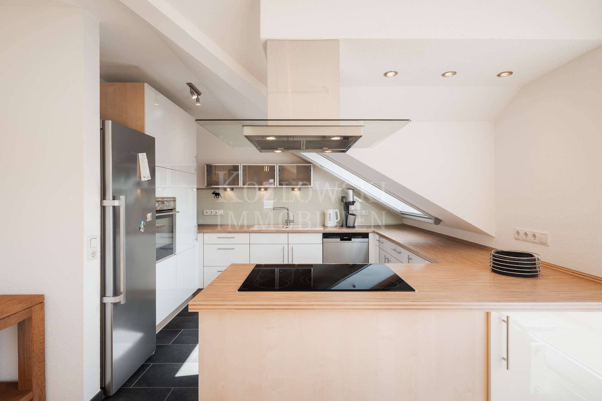 Immobilie in Deidesheim - Ganz oben mit Fernblick - Bezugsfreie Dachwohnung mit Sonnenterrasse! - Bild 0