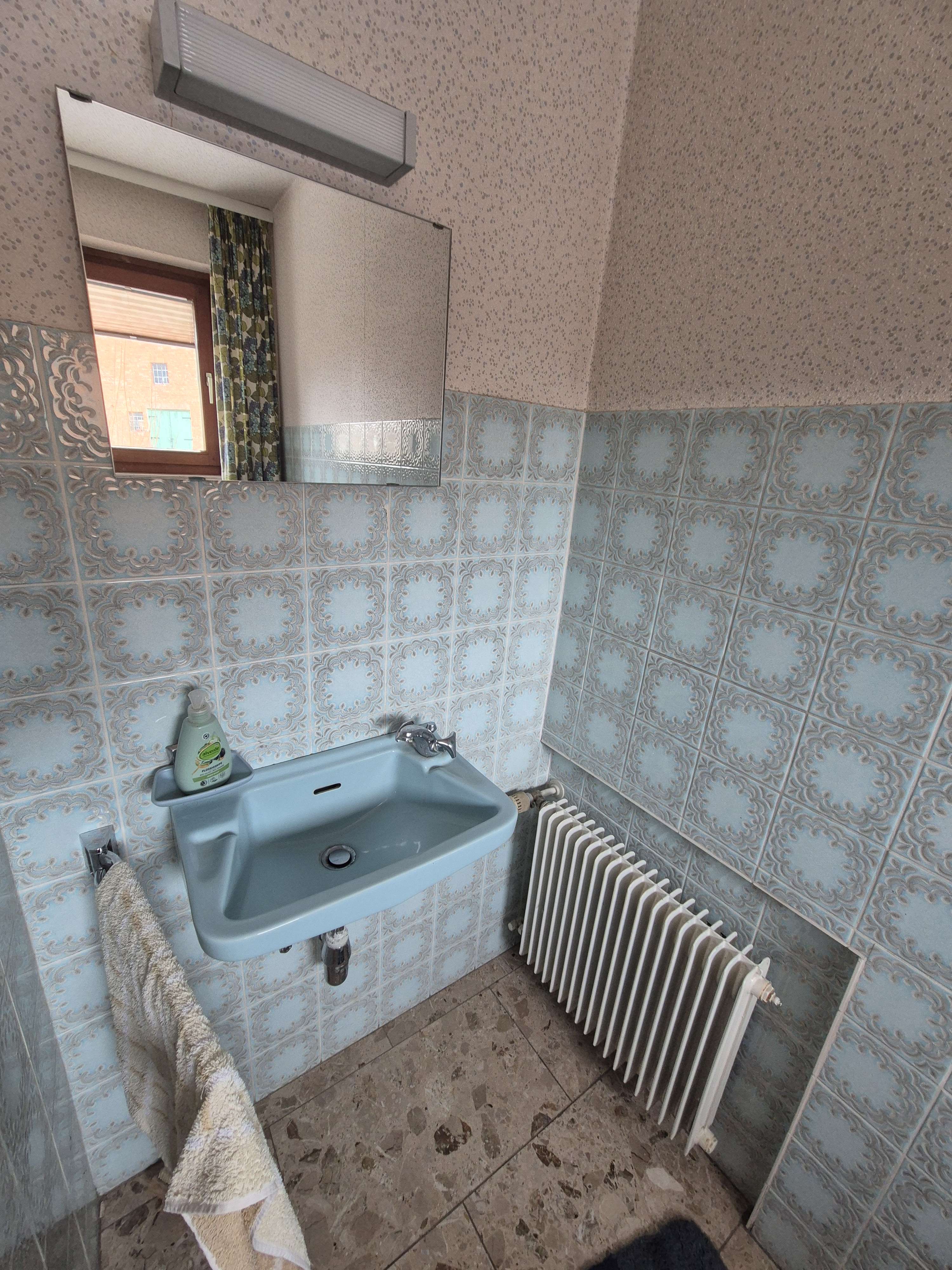 Immobilie in Giesen - Großzügiger Winkelbungalow mit Garage und Einliegerpotenzial in ruhiger Lage von Giesen-Hasede - Bild 1