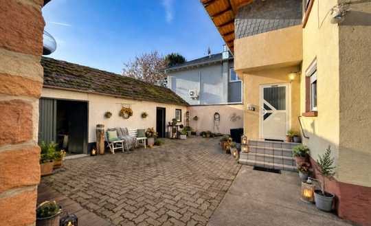 Gepflegtes Familienhaus mit Hof, Garten und Nebengebäuden – viel Platz für 399.000 €