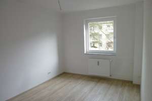 Stilvoll wohnen mit Balkon, Design-Bodenbelag und Einbauküche – Danziger Str. 3, 38440 Wohltberg, Wolfsburg – Vorschaubild 7