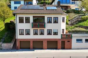 Flexibles Zuhause mit Einliegerwohnung, 3 Garagen & Photovoltaik in Kyllburg – Die vollständige Adresse der Immobilie erhältst du vom Anbieter., 54655 Kyllburg – Vorschaubild 1