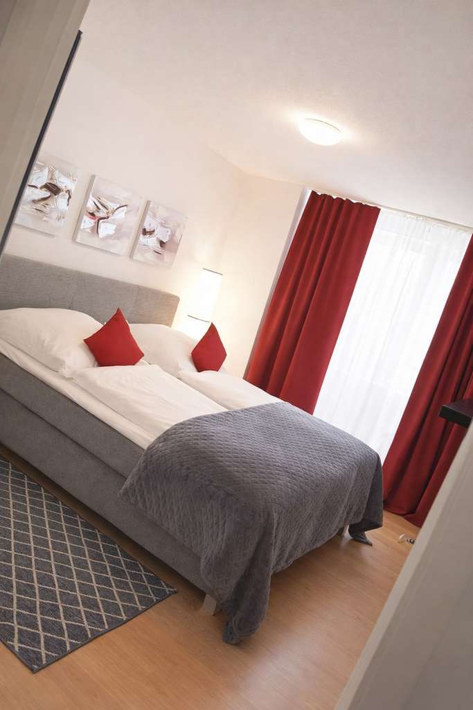 Immobilie in Unterschleißheim - Moderne Maisonette-Wohnung mit 2 Balkonen und viel Licht - perfekte Anbindung nach München - Bild 2