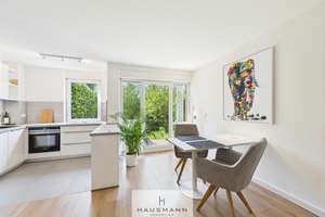 Düsseldorf-Volmerswerth: Stilvolle Gartenwohnung mit Tiefgaragen-Stellplatz, 10 Minuten von Rhein & 