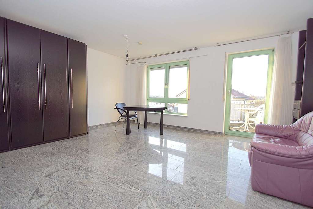 Immobilie in Beuren - Gepflegte 1,5-Zimmer-Wohnung mit Balkon in ruhiger Lage - Bild 2