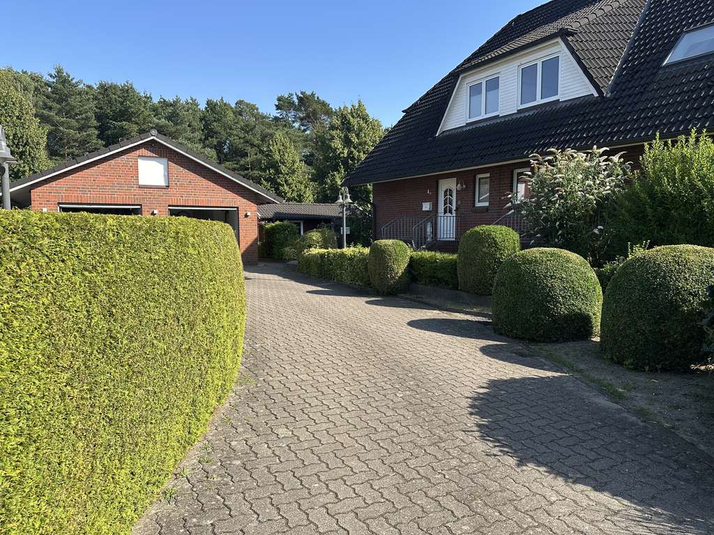 Immobilie in Boostedt - Das reinste Raumwunder: Reihenhaus mit Vollkeller und Garage - Bild 1