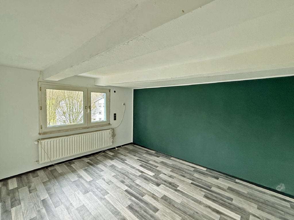 Immobilie in Waldbröl - Charmante Fachwerk-Doppelhaushälfte mit großem Grundstück und Garage - Bild 0