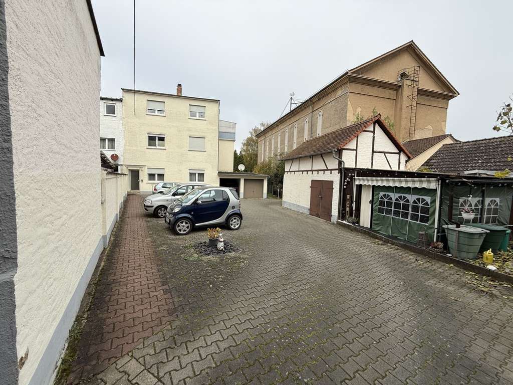 Immobilie in Offenbach am Main - Zweifamilienhaus und Dreifamilienhaus mit Garten und Hof in Offenbach-Bieber, voll vermietet - Bild 3