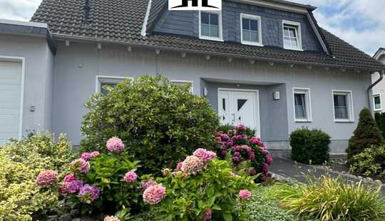 Bild von Attraktives Einfamilienhaus mit Einliegerwohnung GS-Sudmerberg – Gartenidylle inklusive