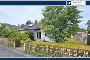 Ihr neues Zuhause in Feldrandlage und doch zentral: Bungalow mit Garten, Garage und großem Potenzial – Hochtaunuskreis – Vorschaubild 1
