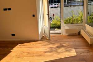 Kernsanierte 1-Zimmer-Wohnung mit Garten
