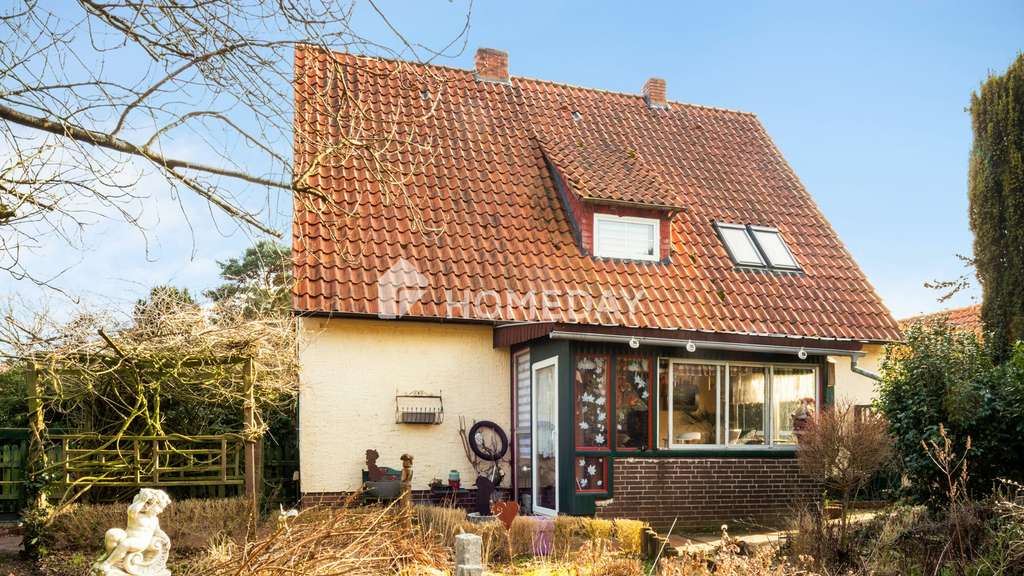 Immobilie in Barver - Gemütliches Einfamilienhaus mit großem Grundstück, 5 Kaminen und Dachterrasse - Bild 0