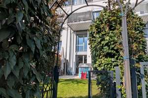 Stadthaus-Feeling pur: Lichtdurchflutete Garten-Maisonette in Mannheims grüner Oase