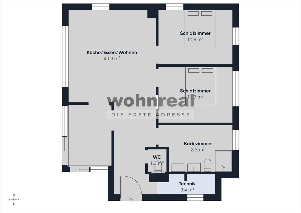 Grundriss einer Wohnung mit offenem Wohnbereich, zwei Schlafzimmern und Bad.