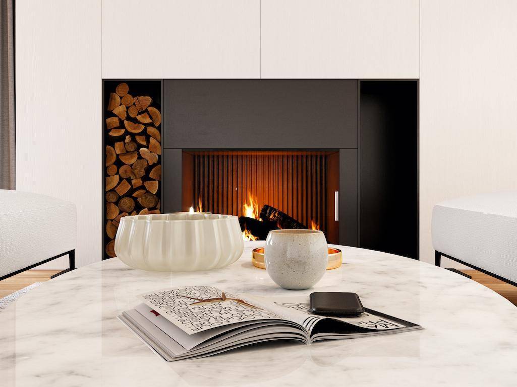Moderner Kamin mit integriertem Holzfach, der eine gemütliche Atmosphäre schafft.