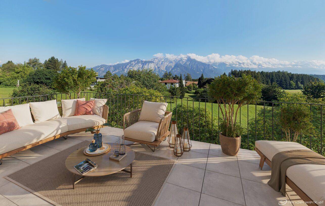Großzügige Terrasse mit bequemen Loungemöbeln und atemberaubendem Bergblick.