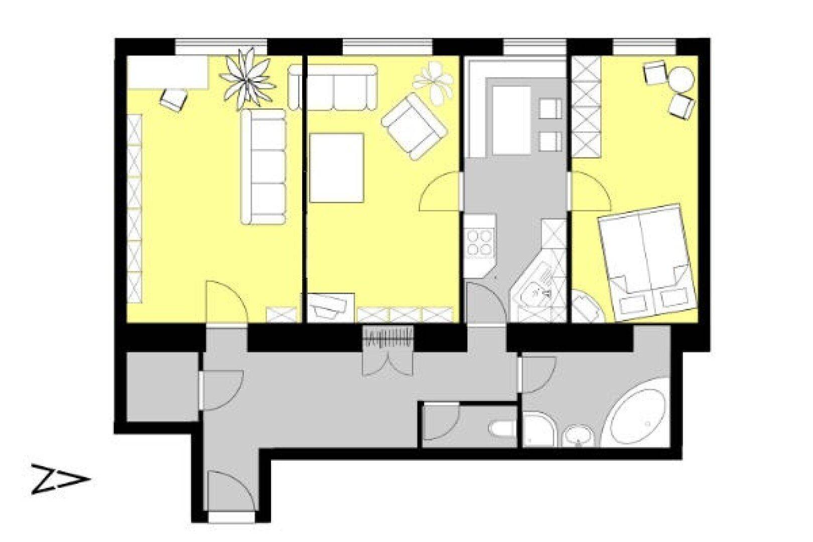 Grundriss zeigt eine Wohnung mit mehreren Zimmern, Bad und separatem WC.