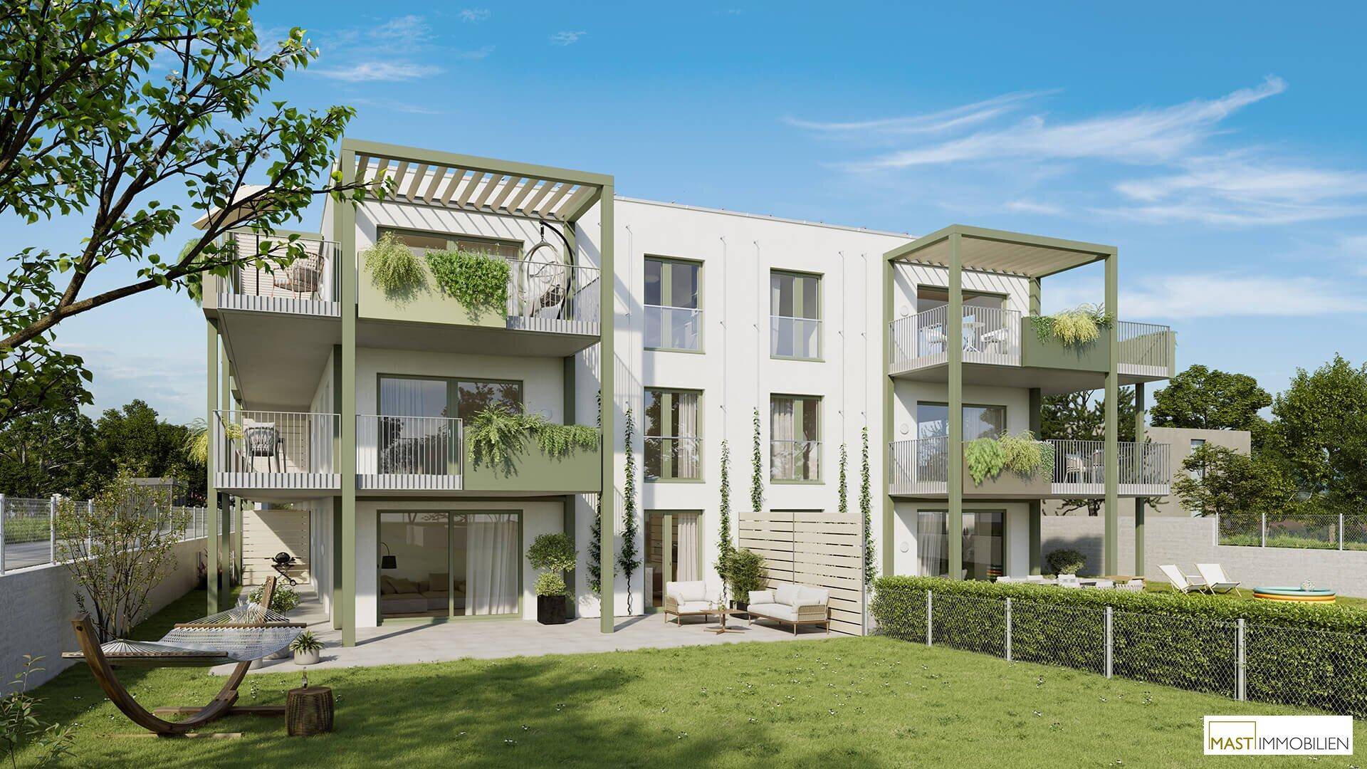 Moderne Wohnanlage mit Balkonen, Terrassen und einem weitläufigen Rasenbereich mit Sitzgelegenheiten.