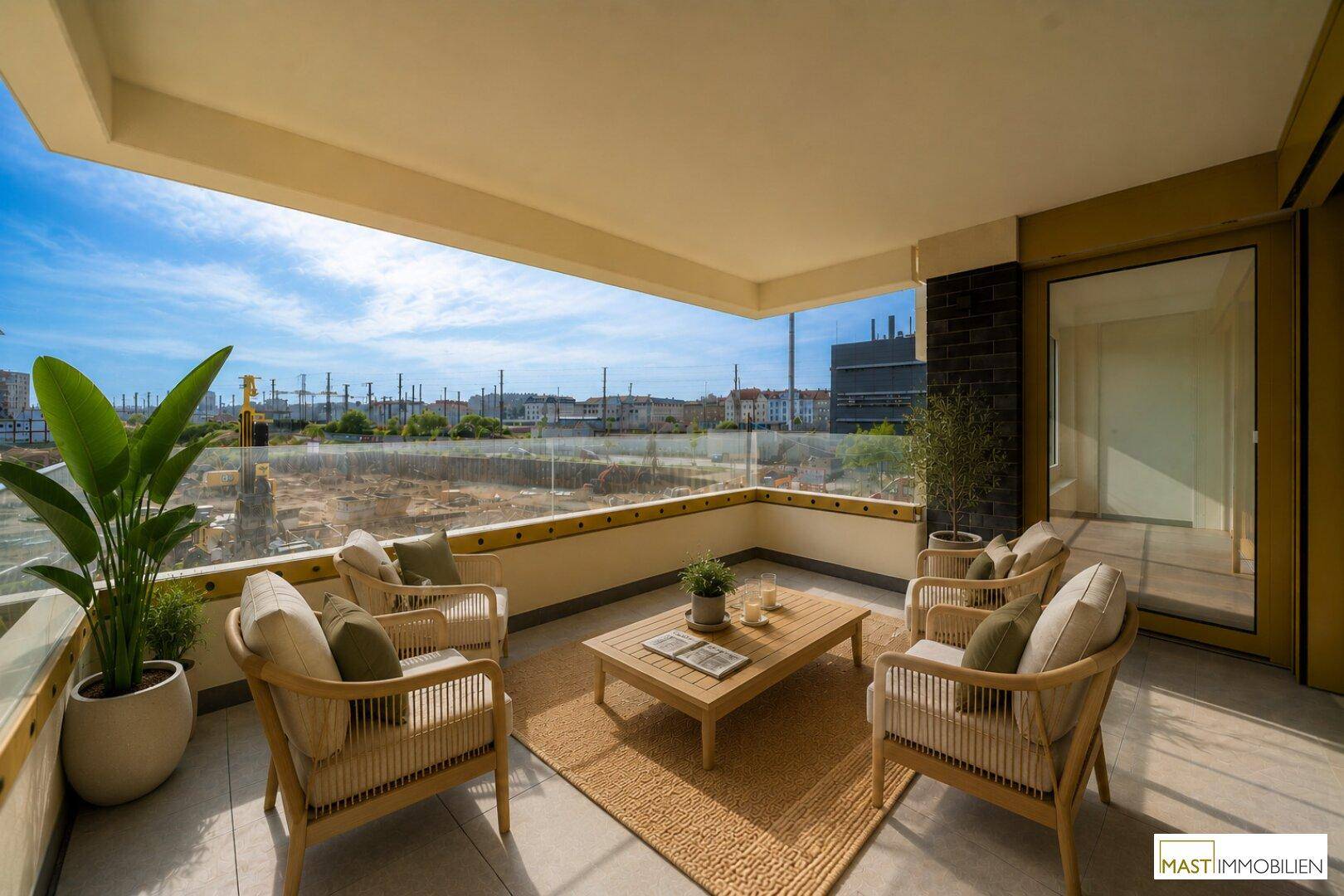 Geräumiger Balkon mit bequemen Sitzgelegenheiten und weitem Blick über die Umgebung.
