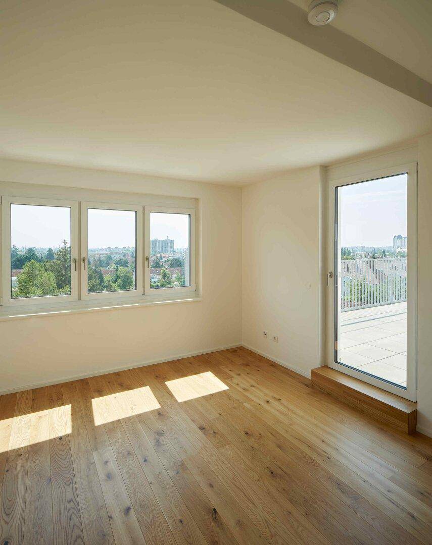 Schlafzimmer mit Terrassenzugang und Walk-In Closet