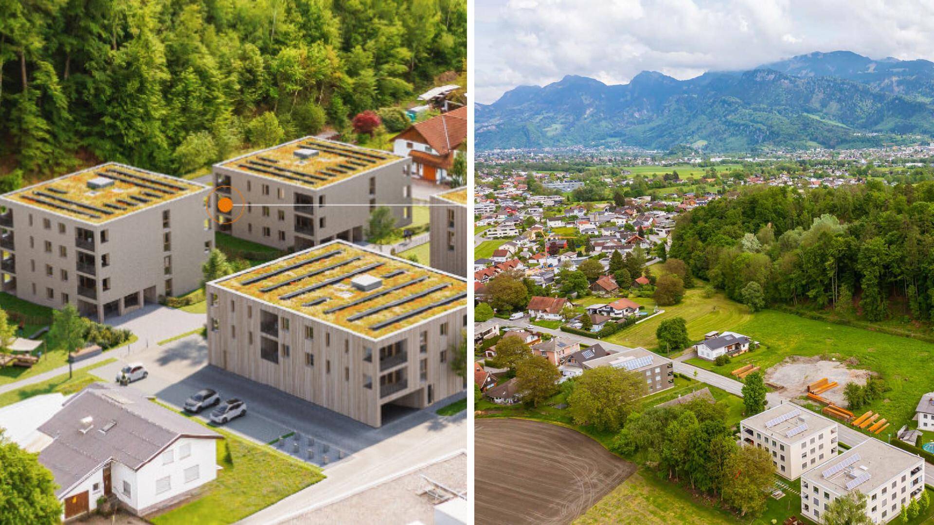 Luftaufnahme einer modernen Wohnanlage mit Photovoltaikanlagen und Blick auf die umliegende Landschaft und Berge.