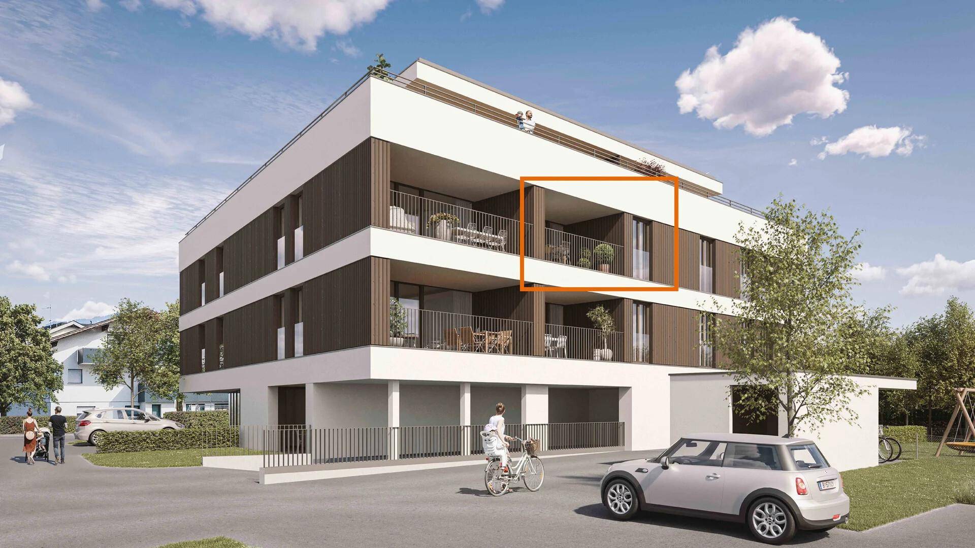 Moderne Wohnanlage mit Balkonen und ansprechender Architektur in grüner Umgebung.