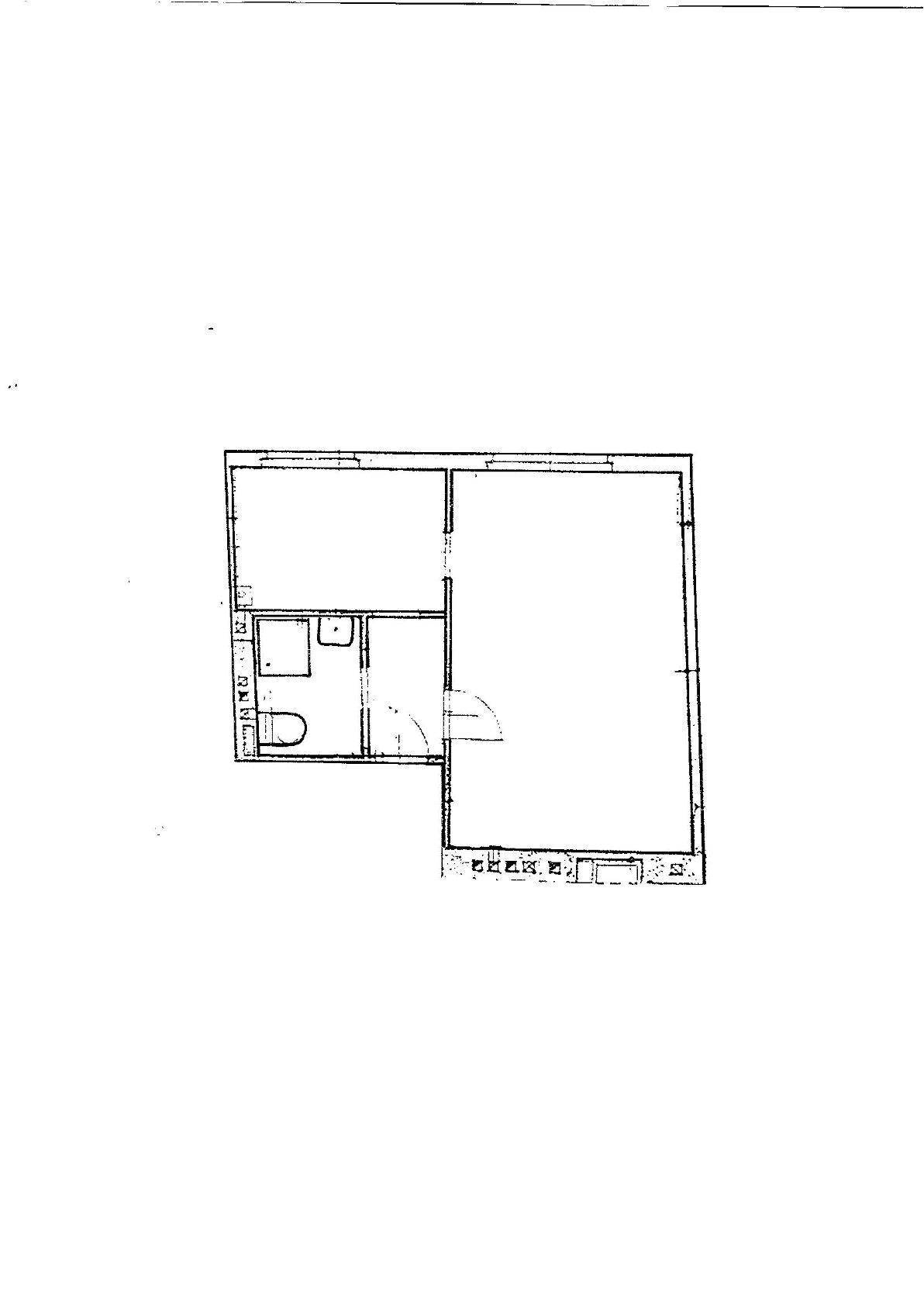 Grundrissplan einer Wohnung mit Bad und einem weiteren Raum.