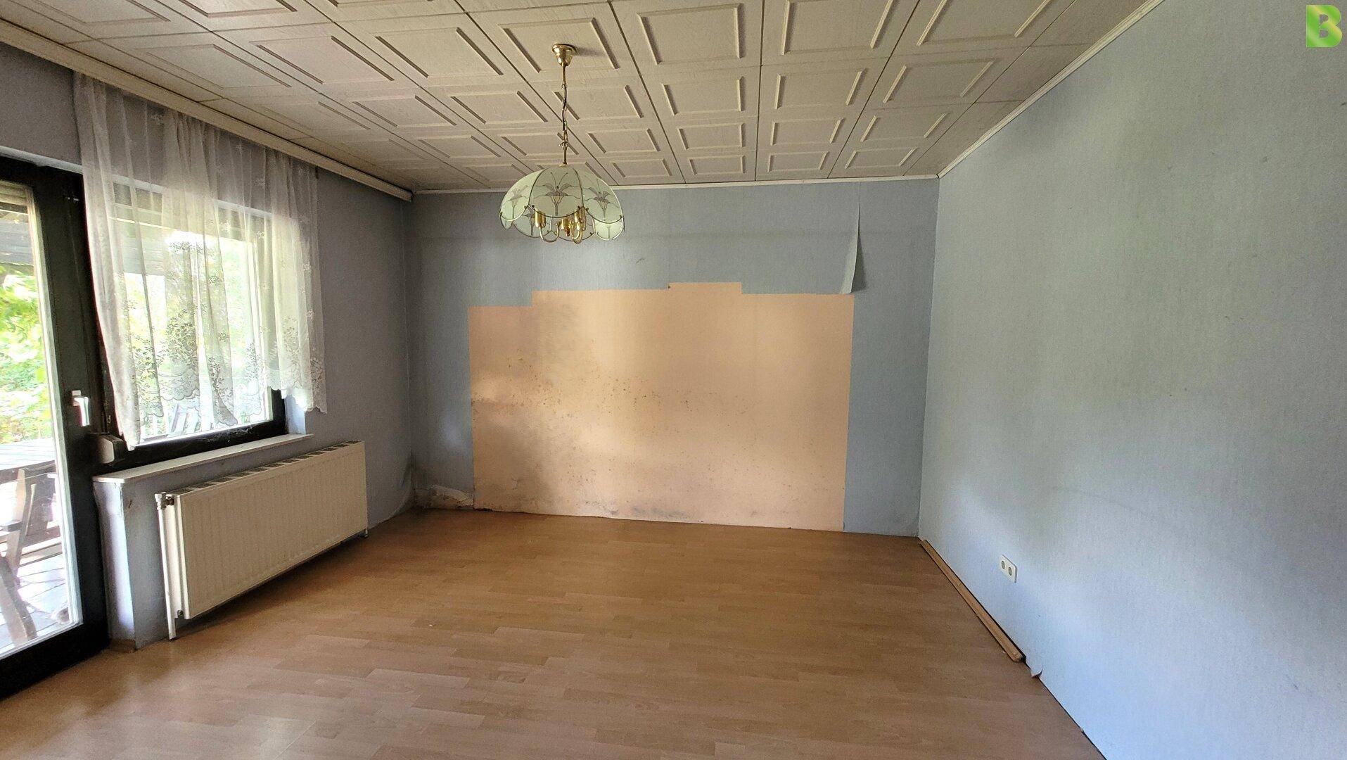 Schlafzimmer mit Ausgang auf die Terrasse