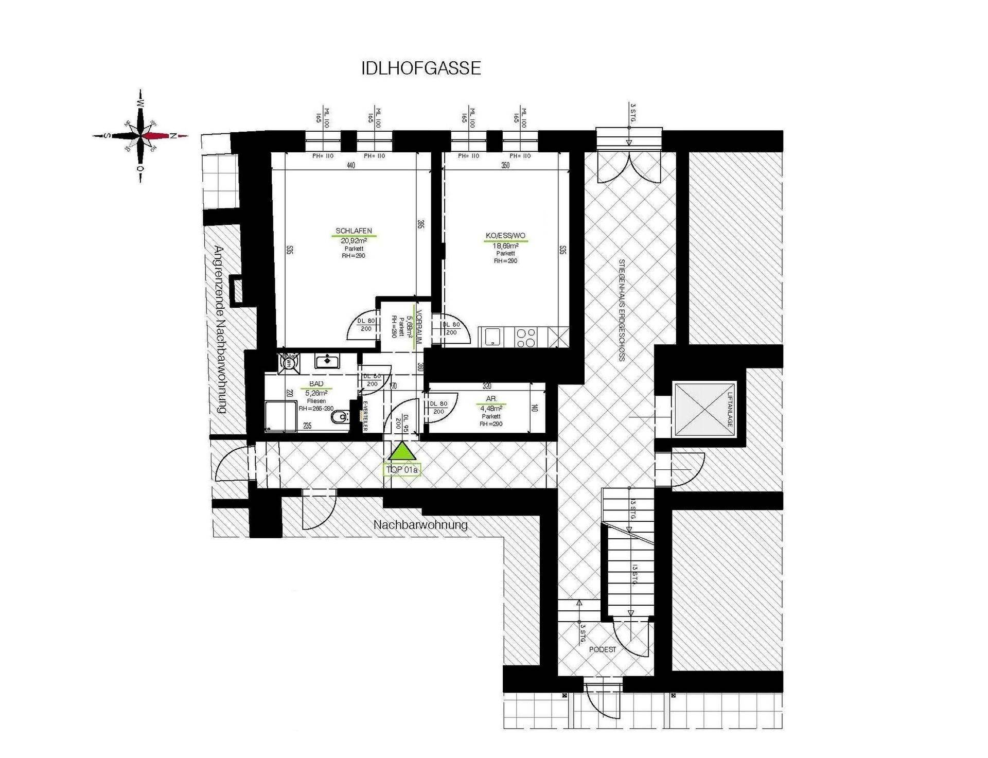 Grundrissplan einer Wohnung mit Schlafzimmer, Kochbereich und Badezimmer.
