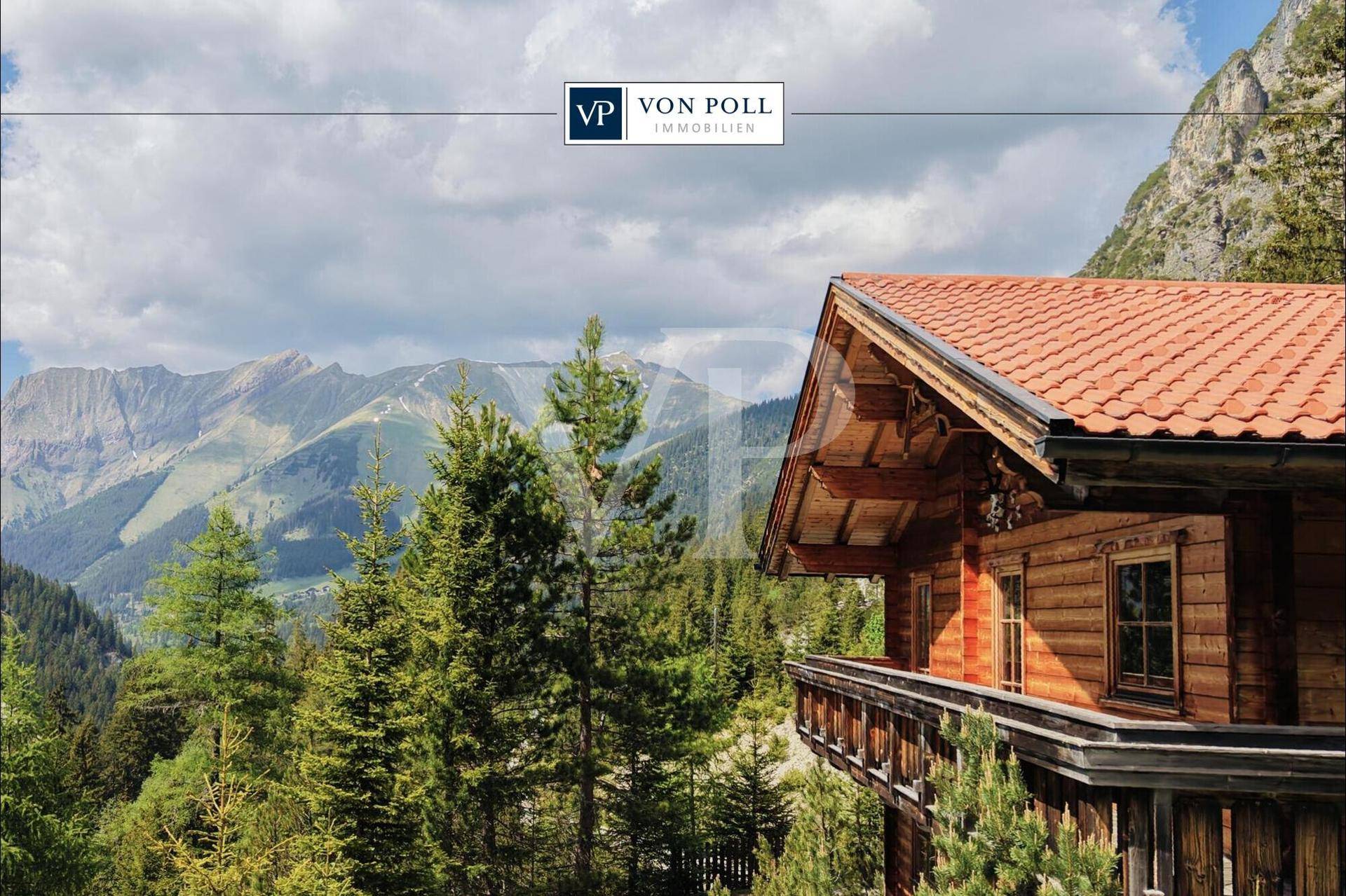 Charmantes Holzchalet inmitten von Pinienwäldern mit weitem Blick auf die majestätische Bergwelt.