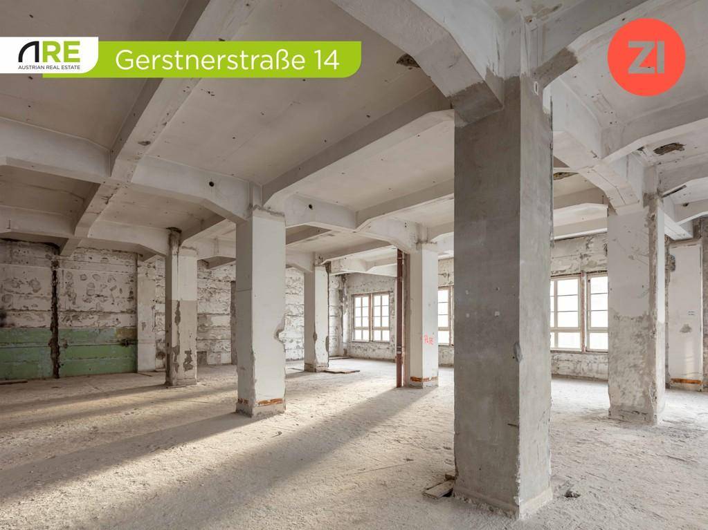 Geräumiger Gewerberaum mit Betonpfeilern, rohen Wänden und viel Potenzial für Umbau.
